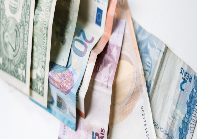 Sterling Slips Versus Euro, Dollar amid Disappointing UK Data